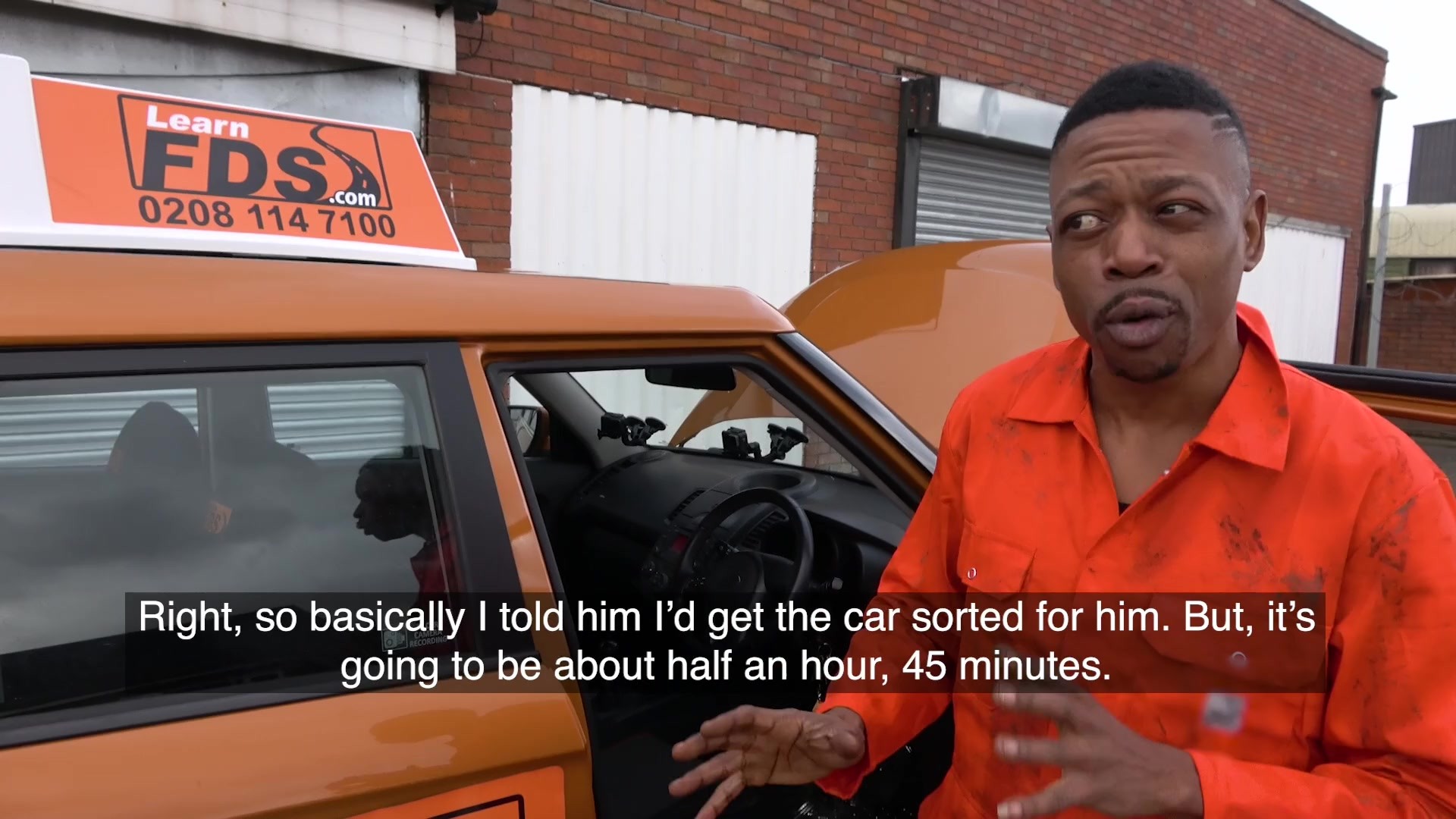 Mechanic gets hands on with learner 3